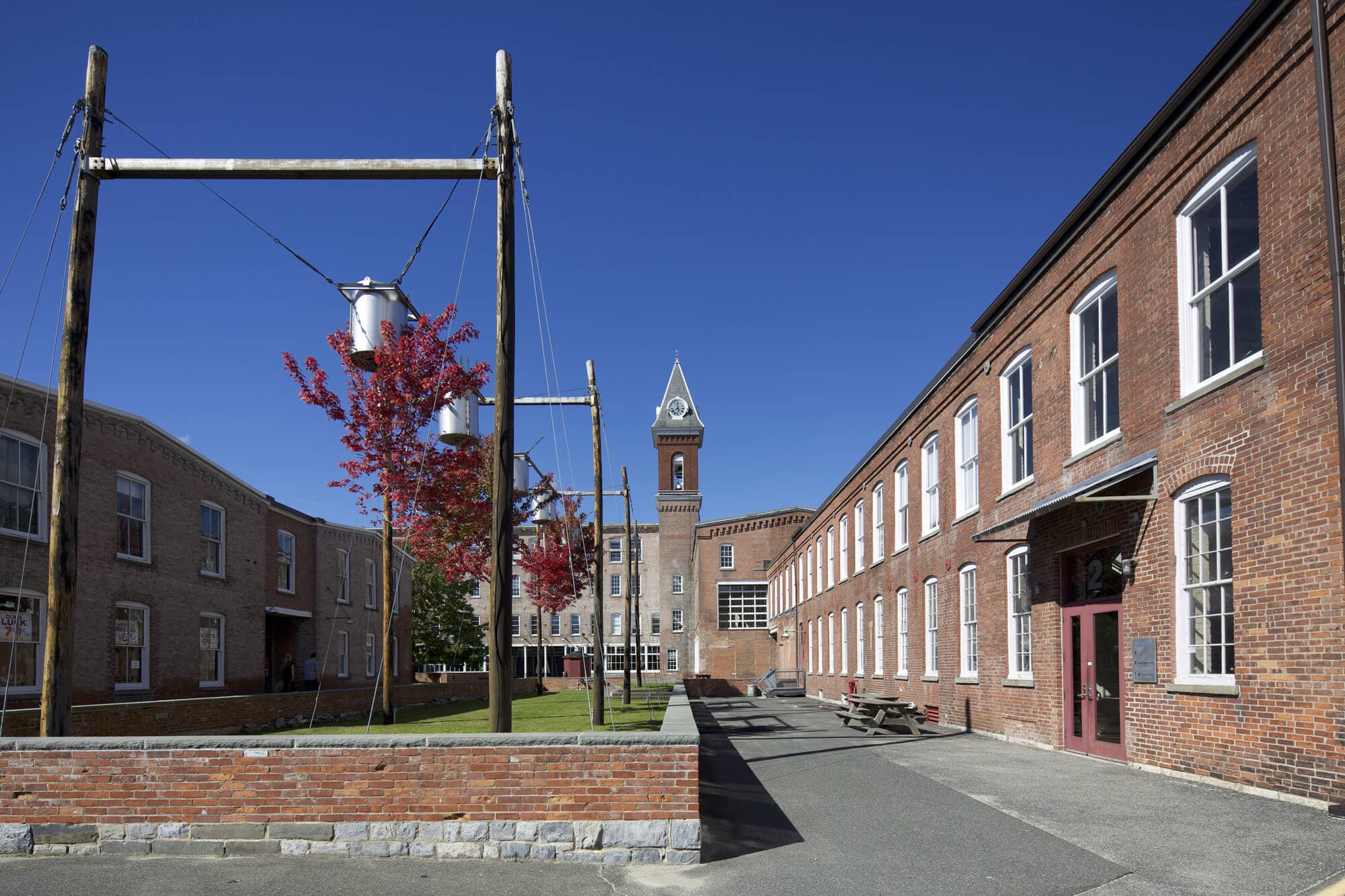 Image of MASS MoCA building in 1999 with clear blue sky.